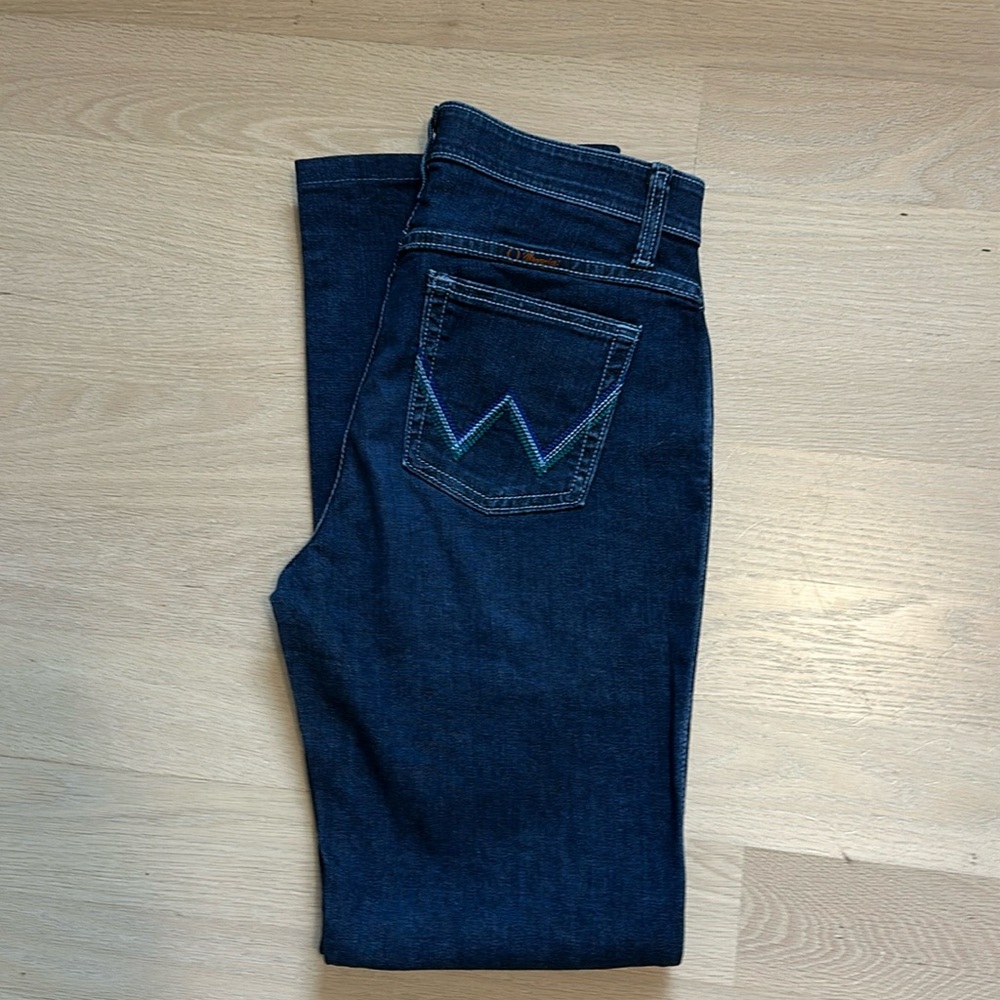 Women’s Q-baby Wrangler jeans medium to darker blue.